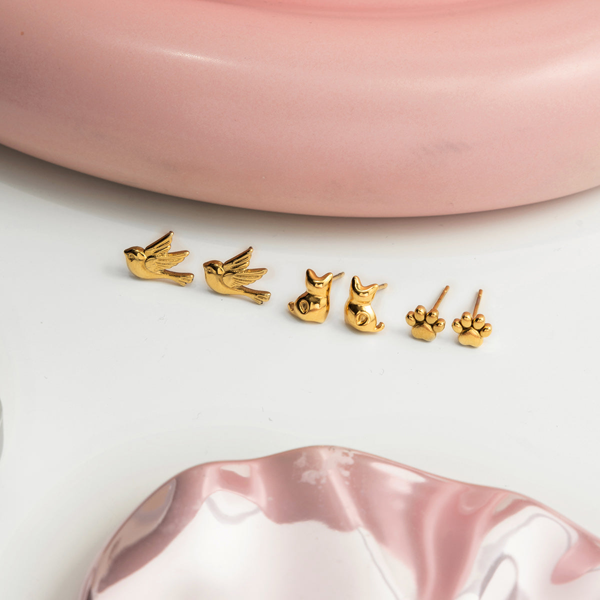 Pendientes con forma gato, pájaro y perro