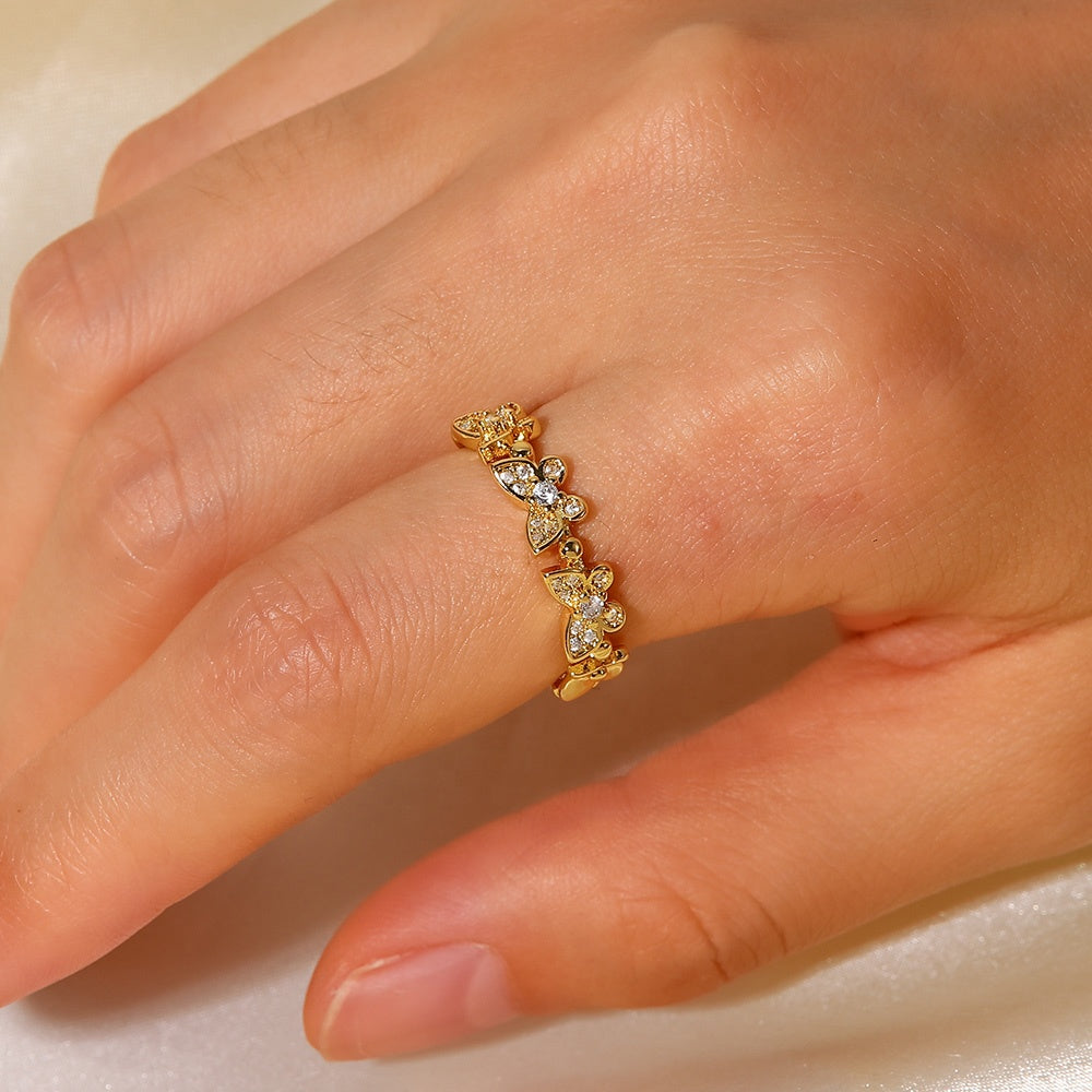 Anillos ajustables y circonita cúbica en forma de mariposa